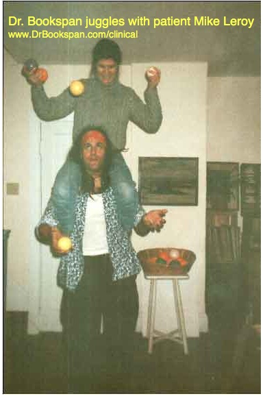 ALT =[“Dr. Jolie Bookspan: Dr. Bookspan juggling with juggler Mike LeRoy after fixing his neck and shoulder pain.”] 
